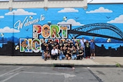 Port Richmond Avenue came alive with music, food, and color on June 8 as La Colmena hosted a lively celebration to unveil a new community mural titled “Welcome to Port Richmond," created by artist Josue Mendez. (Courtesy Judith Prado)