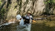 When a turtle at Clove Lakes Park flipped over, NYC Park Ranger Irena Werner jumped into action. Wener also removed debris from the lake while rescuing the turtle who unfortunately was not alive when it was rescued. (Photo courtesy of NYC Parks)