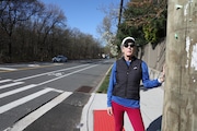 Liz Morano was hit by a car on Hylan Boulevard at Bedell Avenue in Tottenville in 2019 and suffered a broken leg. Here, she poses at the intersection on April 18, 2025.