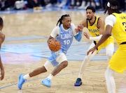 Cleveland Cavaliers guard Darius Garland drives against the Indiana Pacers in the first half of play. 