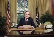 In this Dec. 20, 1989, file photo, President George H.W. Bush addresses the nation on television from the Oval Office in Washington as he explains his decision to deploy American troops to Panama. 