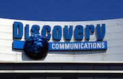 FILE - The Discovery Communications logo atop its headquarters in Silver Spring, Md, July 31, 2017. (AP Photo/Manuel Balce Ceneta, File)