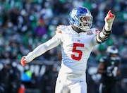 New York Giants linebacker Kayvon Thibodeaux (5) reacts after a sack during the second half against the Philadelphia Eagles, Sunday, Jan. 5, 2025, in Philadelphia. The Eagles won, 20-13.
