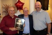 Scott Rothman poses with his plaque after receiving the CYO "Sports Official of the Year" award on June 3, 2025.