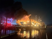 An eyewitness shared this photo of multiple boats are on fire in dry dock on Mansion Avenue at Great Kills Harbor on the morning of Wednesday, Dec. 11, 2024.