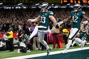 Philadelphia Eagles defensive back Cooper DeJean (33) scores a touchdown after intercepting a pass during the first half of the NFL Super Bowl 59 football game against the Kansas City Chiefs, Sunday, Feb. 9, 2025, in New Orleans. (AP Photo/George Walker IV)